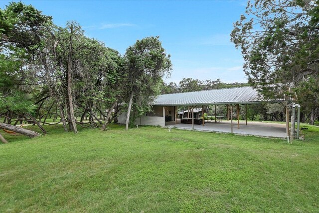 view of yard featuring a carport