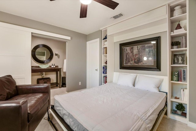 bedroom with baseboards, ceiling fan, and visible vents