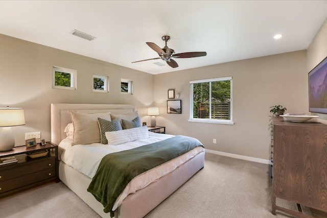 bedroom featuring visible vents, carpet, baseboards, and a ceiling fan