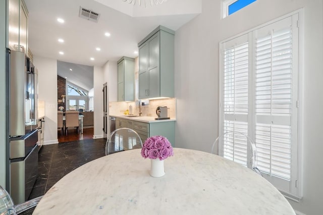 3605 Fawn Creek Path, Austin, TX 78746 - dining space with recessed lighting and vaulted ceiling