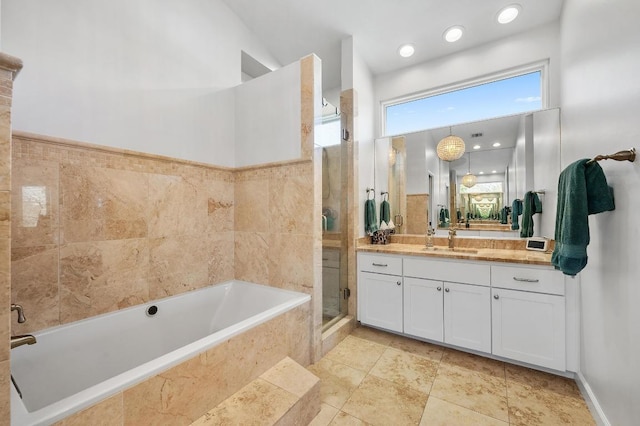3605 Fawn Creek Path, Austin, TX 78746 - full bathroom with vanity, a garden tub, and a stall shower