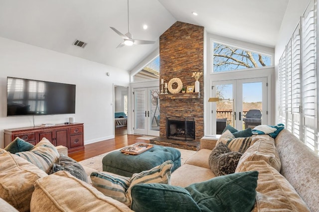 3605 Fawn Creek Path, Austin, TX 78746 - living area featuring french doors, healthy amount of natural light, high vaulted ceiling, wood finished floors, and a ceiling fan