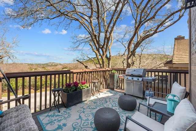 3605 Fawn Creek Path, Austin, TX 78746 - deck featuring area for grilling and an outdoor hangout area