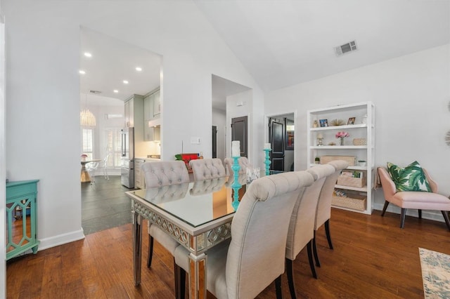 3605 Fawn Creek Path, Austin, TX 78746 - dining area with dark wood-style flooring, a chandelier, recessed lighting, and high vaulted ceiling