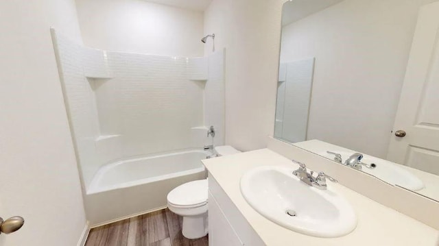325 Enforcer Loop, Jarrell, TX 76537 - full bath featuring toilet, wood finished floors, vanity, and shower / bathtub combination