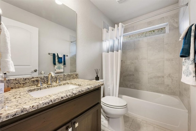 bathroom with vanity, shower / bath combo, and toilet