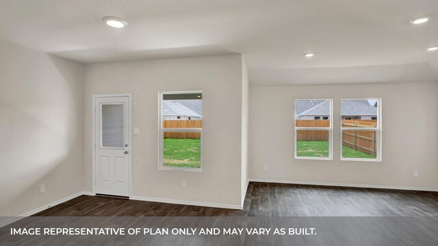 entryway featuring recessed lighting, baseboards, plenty of natural light, and dark wood finished floors
