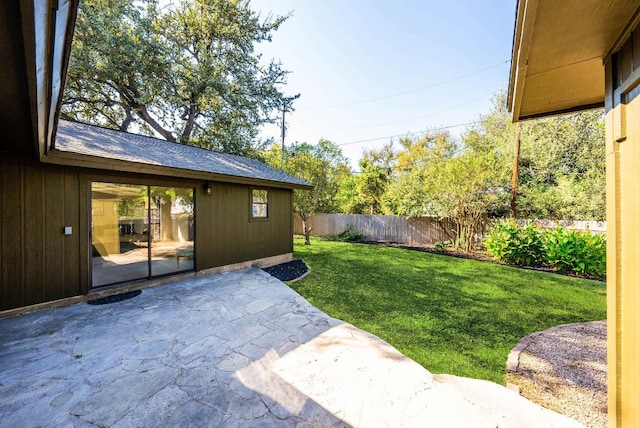 view of yard with a fenced backyard and a patio area