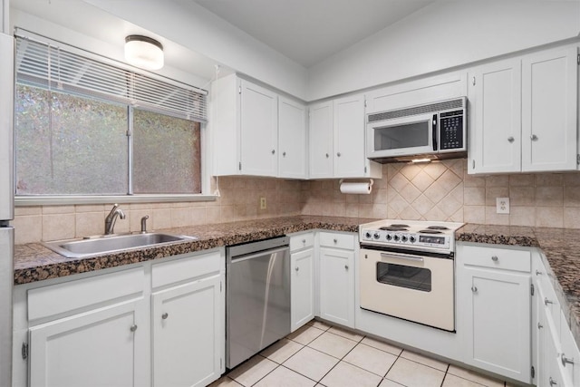 1304 Mariposa Dr Unit 231, Austin, TX 78704 - kitchen with stainless steel appliances, a sink, and white cabinets