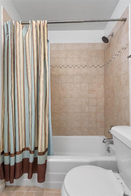 1304 Mariposa Dr Unit 231, Austin, TX 78704 - full bath with toilet, shower / bath combo, and tile patterned floors