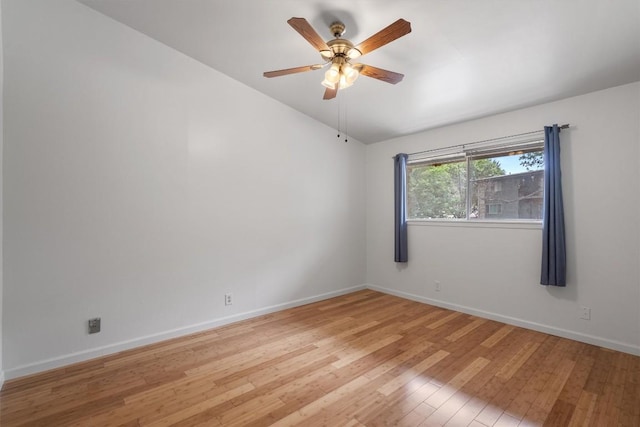 1304 Mariposa Dr Unit 231, Austin, TX 78704 - spare room with light wood-style floors, baseboards, ceiling fan, and lofted ceiling
