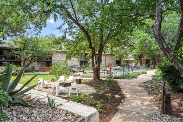 1304 Mariposa Dr Unit 231, Austin, TX 78704 - view of yard featuring a fire pit and a patio area