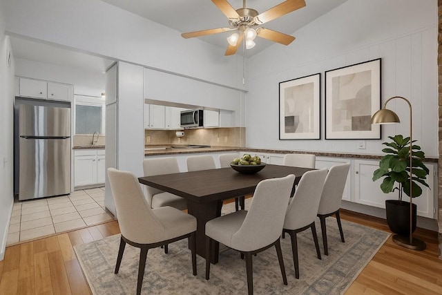1304 Mariposa Dr Unit 231, Austin, TX 78704 - dining room featuring light wood-type flooring and a ceiling fan
