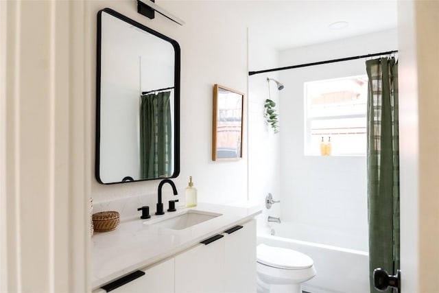 5731 Wellington Dr, Austin, TX 78723 - full bath featuring toilet, shower / bath combination with curtain, and vanity