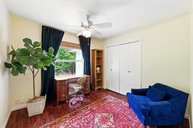 office featuring baseboards, ceiling fan, and wood finished floors