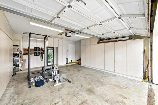 garage featuring a garage door opener