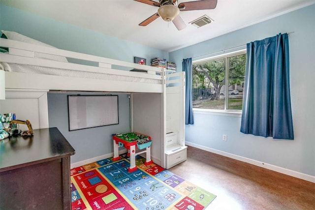 bedroom with visible vents, baseboards, and ceiling fan