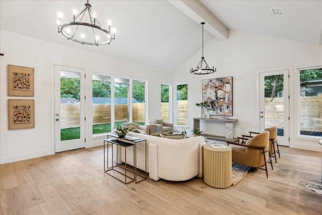 living room featuring light wood-style floors, high vaulted ceiling, a chandelier, beamed ceiling, and visible vents