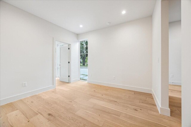 4708 Philco Dr, Austin, TX 78745 - spare room with light wood-style flooring, baseboards, and recessed lighting