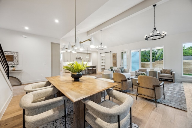 4708 Philco Dr, Austin, TX 78745 - dining room with a chandelier, light wood-style floors, baseboards, and recessed lighting