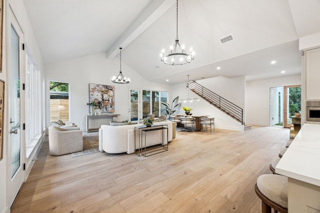 4708 Philco Dr, Austin, TX 78745 - living room featuring a chandelier, stairs, light wood-type flooring, high vaulted ceiling, and beamed ceiling