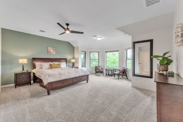 carpeted bedroom with baseboards, ceiling fan, and visible vents
