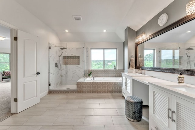 10636 Bramblecrest Dr, Austin, TX 78726 - bathroom featuring healthy amount of natural light, a bath, double vanity, a marble finish shower, and recessed lighting