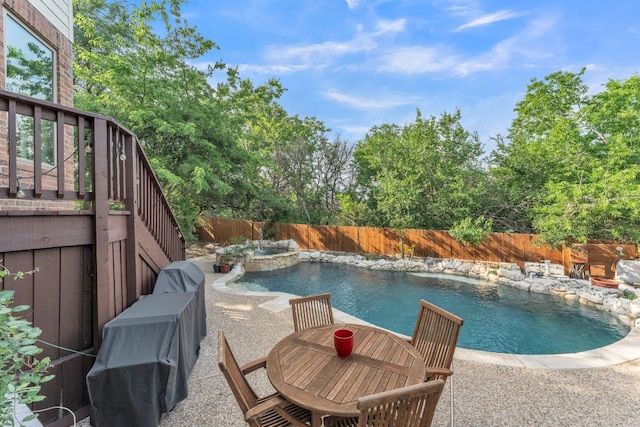 10636 Bramblecrest Dr, Austin, TX 78726 - view of swimming pool with a fenced backyard, stairway, a patio area, and a pool with connected hot tub