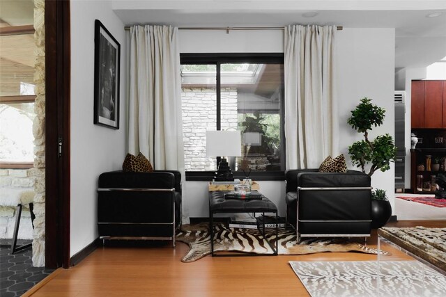 living area featuring wood finished floors