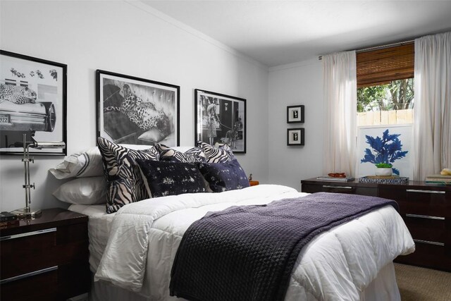 bedroom with crown molding