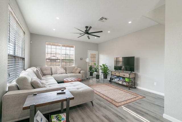 16100 S Great Oaks Dr Unit 3602, Round Rock, TX 78681 - living area featuring wood finished floors, a ceiling fan, and recessed lighting