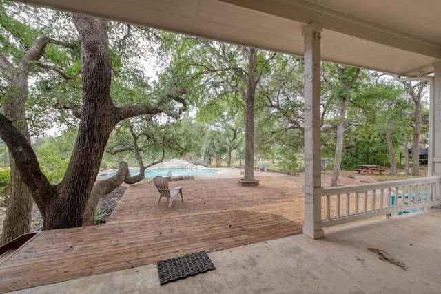 exterior space featuring an outdoor pool and a patio area