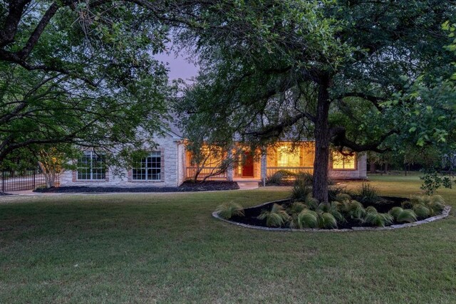 323 Allen Cir, Georgetown, TX 78633 - rear view of property with a yard