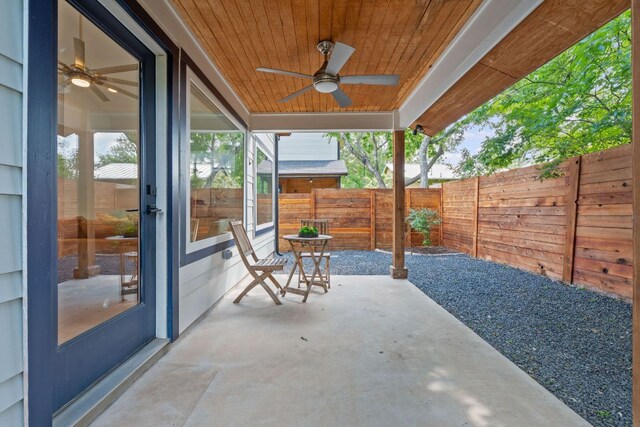 view of patio featuring a ceiling fan and a fenced backyard