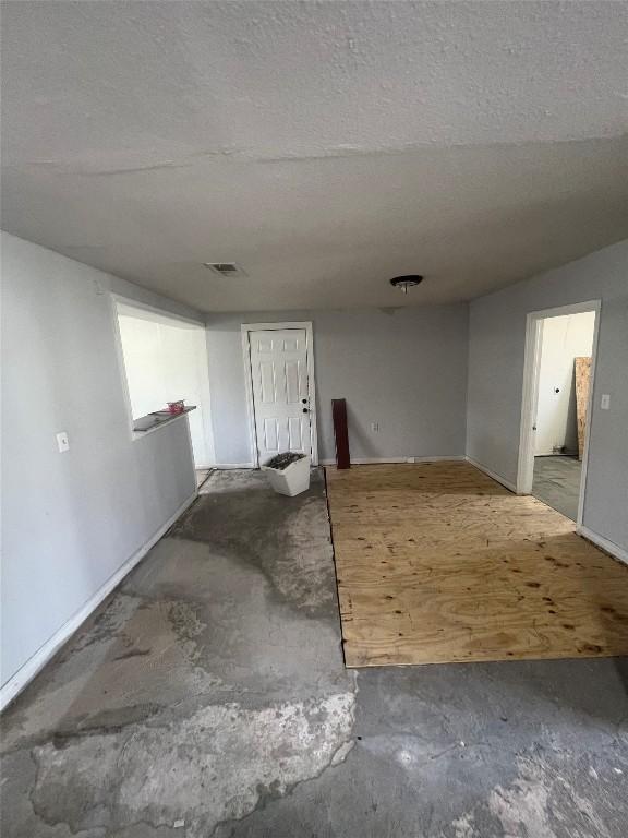 basement featuring visible vents