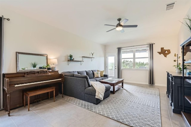 733 Melda St, Leander, TX 78641 - living room featuring light tile patterned flooring and a ceiling fan