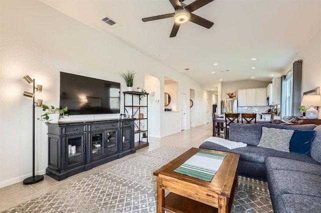 733 Melda St, Leander, TX 78641 - living area with light tile patterned flooring, ceiling fan, and recessed lighting