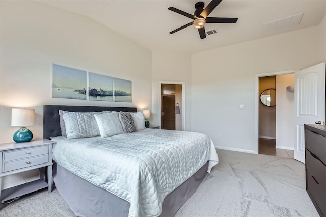 733 Melda St, Leander, TX 78641 - carpeted bedroom with a ceiling fan and ensuite bath