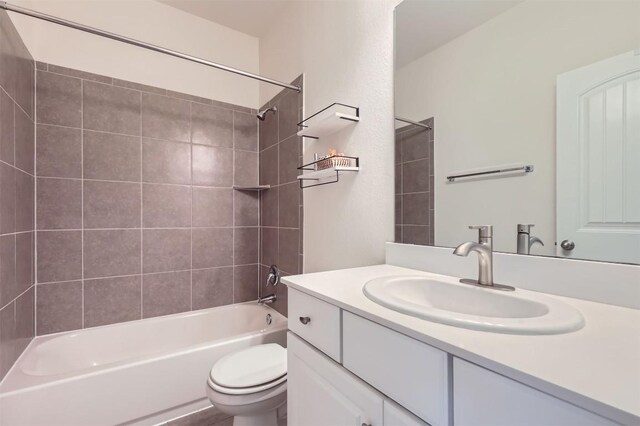 full bath with vanity, bathing tub / shower combination, and toilet