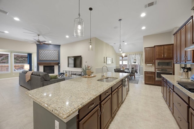 202 Parkwest Dr, Cedar Park, TX 78613 - kitchen with visible vents, ceiling fan, a spacious island, a sink, and stainless steel appliances