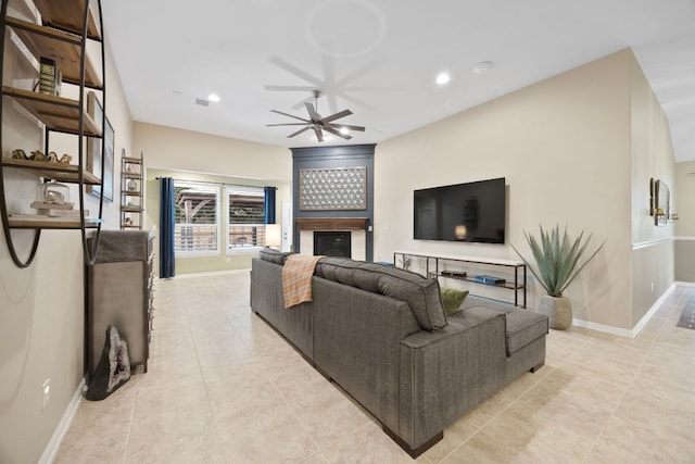 202 Parkwest Dr, Cedar Park, TX 78613 - living room with a ceiling fan, a tiled fireplace, light tile patterned floors, baseboards, and recessed lighting