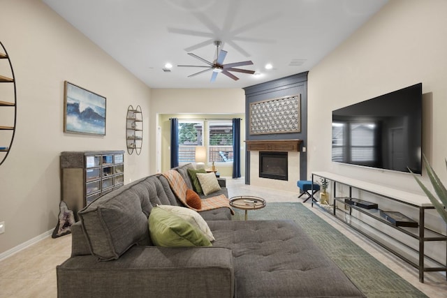 202 Parkwest Dr, Cedar Park, TX 78613 - living room with ceiling fan, a large fireplace, recessed lighting, baseboards, and light tile patterned floors