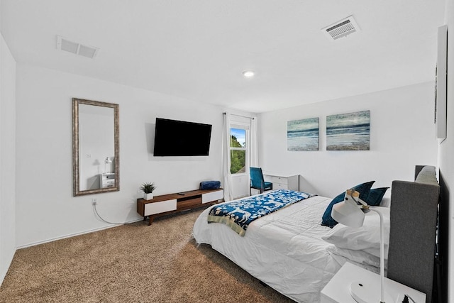bedroom featuring visible vents and carpet flooring