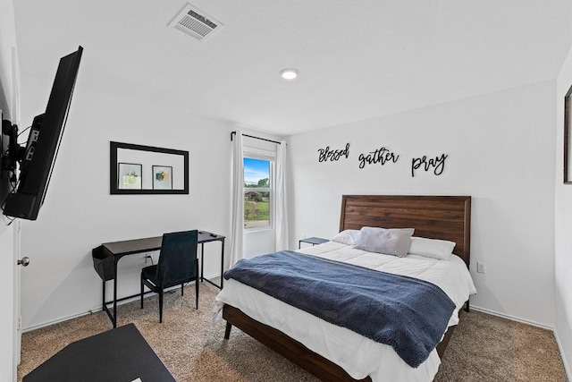 bedroom with carpet flooring, baseboards, and visible vents