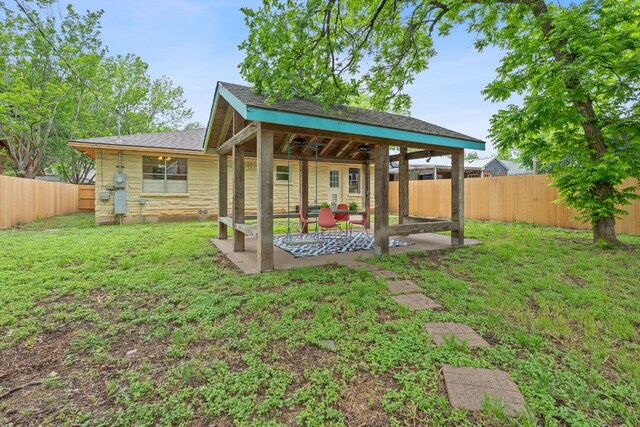 view of yard featuring a patio and a fenced backyard