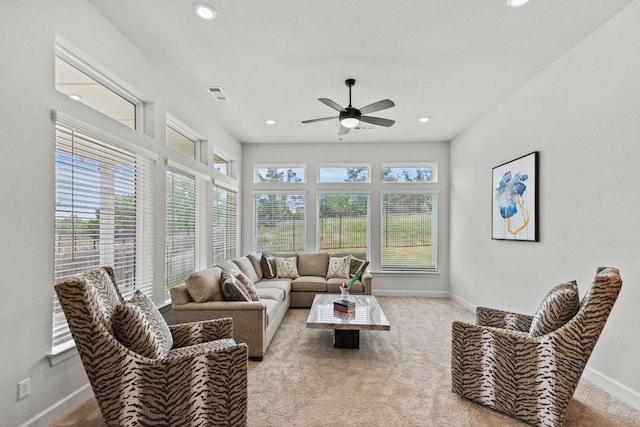 991 Hazy Hills Loop, Dripping Springs, TX 78620 - living area with baseboards, light carpet, a ceiling fan, and visible vents