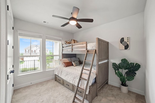 991 Hazy Hills Loop, Dripping Springs, TX 78620 - bedroom with carpet floors, a ceiling fan, baseboards, and visible vents