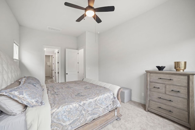 991 Hazy Hills Loop, Dripping Springs, TX 78620 - bedroom featuring light colored carpet, ceiling fan, visible vents, and baseboards