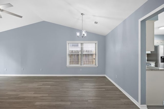 4411 Cumbria Ln, Austin, TX 78727 - unfurnished dining area with vaulted ceiling, a chandelier, dark wood finished floors, and a ceiling fan