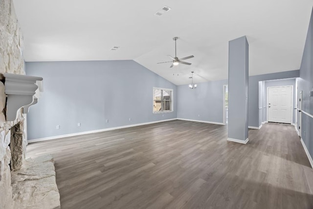 4411 Cumbria Ln, Austin, TX 78727 - unfurnished living room with a ceiling fan, lofted ceiling, wood finished floors, and a fireplace with raised hearth
